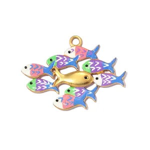 Detail of a large stainless steel enamel fish pendant for jewelry making