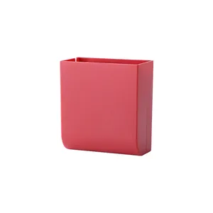 Red wall-mounted stationery organizer for office desk and phone charging stand
