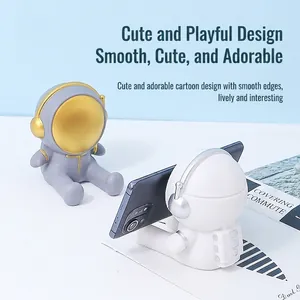Creative astronaut phone holder stand for desk decoration, perfect for office and home use