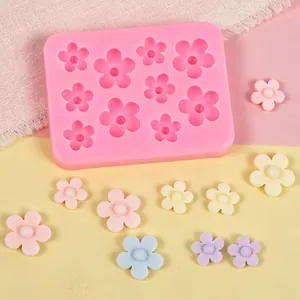 Macro view of pink flower silicone mold with finished colorful clay flower samples