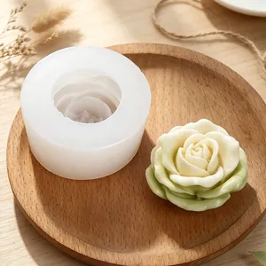 Detailed view of 3D rose silicone mold and finished handmade soap flower detail