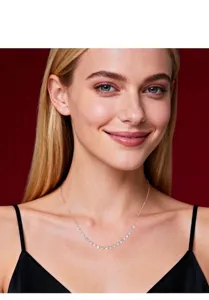 Model wearing a delicate Moissanite smiley face pendant necklace in a refined gold finish