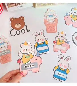 Close-up view of DIY cartoon scratch-off reward cards designed for children's interactive play