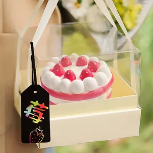 Handmade DIY colorful scratch art tags used as gift box decorations with a strawberry.