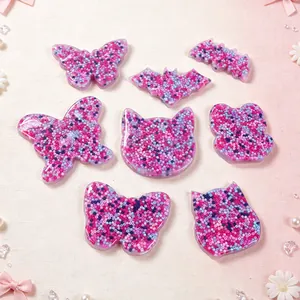 Detail view of silicone skin picking fidget toys in butterfly, bat, and cat shapes.