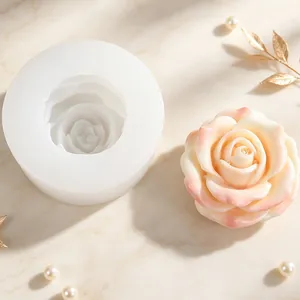 Detailed view of 3D rose silicone mold alongside a delicate pink handcrafted floral soap