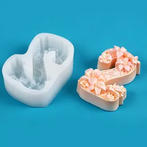 Detailed macro view of floral relief number 2 silicone mold and finished candle model