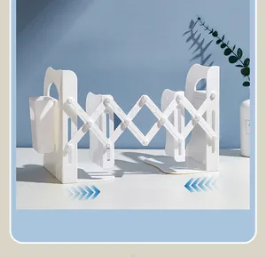 Adjustable white plastic bookend with telescopic scissor design for desk storage