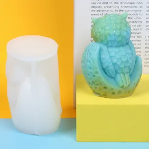 Detailed macro view of DIY owl-shaped silicone mold and textured candle finished product