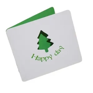 Minimalist white hollow-out Christmas tree greeting card with green Happy Day text