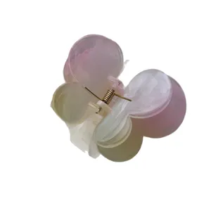 Elegant gradient pink and green butterfly flower hair claw clip for versatile hair styling