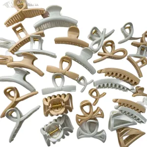 Large minimalist hair claw clips set in neutral beige and grey tones matte finish