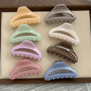 Selection of eight minimalist acrylic shark hair clips in assorted Morandi colors