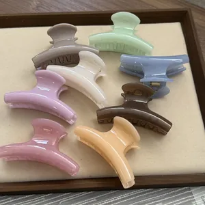 Selection of small jelly-textured hair claw clips in assorted pastel colors