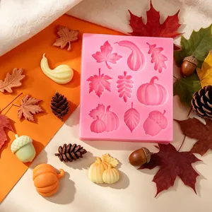 Autumn harvest themed pink silicone mold featuring pumpkins maple leaves and acorns.