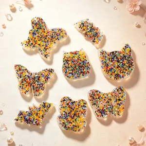 Detailed view of bead-filled silicone skin picking fidget toys in butterfly and animal shapes