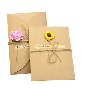 Vintage handmade kraft paper cards with artificial flowers and hemp rope for gift sets