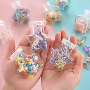Macaron colored binder clips and thumbtacks set in star-shaped storage bottles for office