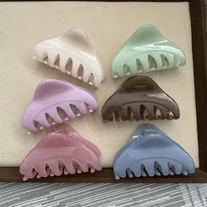 Set of 6 colorful Korean style medium triangle hair claw clips in matte finish.