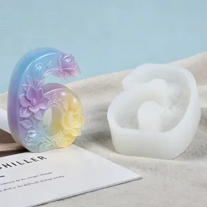 Close-up of number 6 silicone mold featuring detailed floral relief for candle making