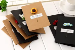 Collection of retro kraft paper and black greeting cards with colorful 3D dried flowers