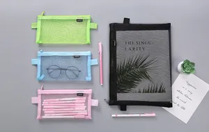 Detailed view of colorful mesh pencil cases and A4 file bag with stationery props.
