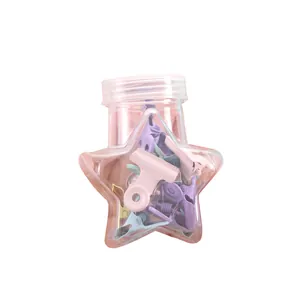 Pastel macaron binder clips in a star-shaped storage bottle for office and school