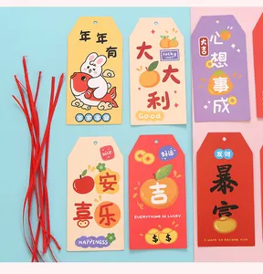 Macro view of cute cartoon paper bookmarks with inspirational Chinese characters