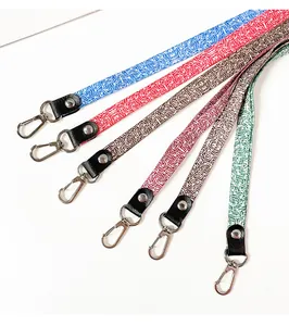 Detailed view of colorful patterned lanyards with durable metal swivel lobster hooks.