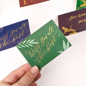 Creatieve wenskaarten met goudfolie en 'Wish you all the best' tekst voor geschenken
