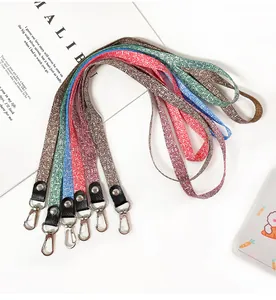 Detailed view of colorful lanyards with geometric patterns and sturdy metal clips