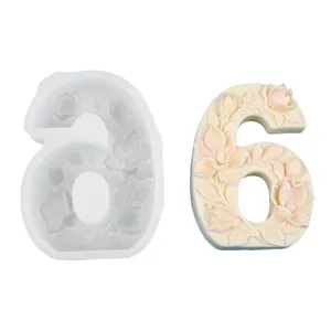 Professional view of the floral relief number 6 silicone mold with finished candle
