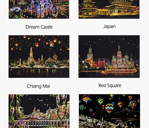 Vista detallada de varias tarjetas de rascado con famosos paisajes urbanos nocturnos.