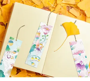 DIY children's watercolor bookmarks with fairy and animal illustrations in a notebook