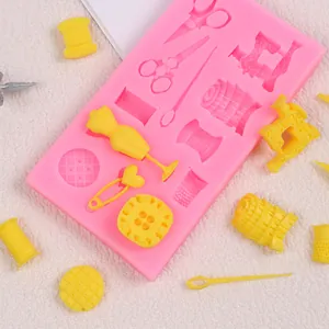Detailed view of sewing-themed silicone mold for chocolate and fondant cake decorating
