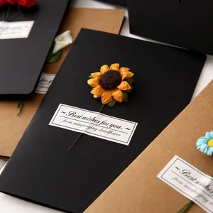 Handmade dried flower greeting card on vintage black and kraft paper stock