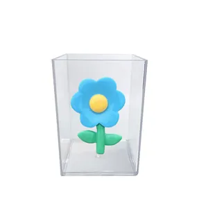 Niedlicher minimalistischer Acryl-Stifthalter mit blauer Blume für den Schreibtisch