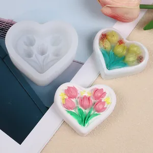 Detailed macro view of heart-shaped tulip silicone mold with colorful finished soap crafts.