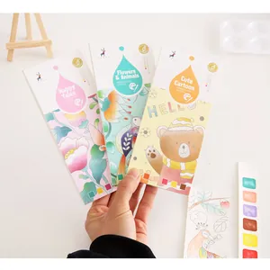 Close-up of portable watercolor bookmark booklets with built-in paint and cute themes