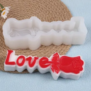 Detailed view of 3D Love letter and rose silicone mold with finished sample