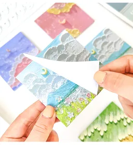 Detailed view of scenery oil painting sticky notes with textured cloud and flower patterns