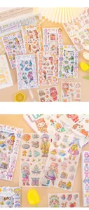 Detailed macro view of cute cartoon character stickers for DIY scrapbooking and journals.