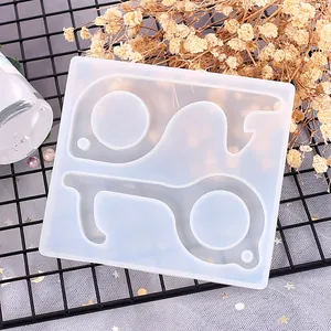 Close-up of silicone mold for DIY no-touch keychain and elevator door opener