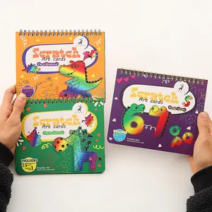 Creative set of three colorful cartoon scratch art pads for kids with spiral binding.