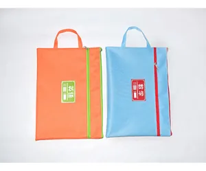 Durable A4 Oxford cloth school subject folders in orange and blue with ID label sections
