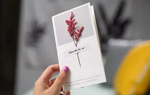 Elegant handmade greeting card with a real dried flower and poetic English message