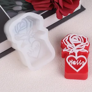 Detailed view of rose and heart Hello silicone mold with a red finished candle sample