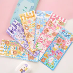 Colorful DIY cartoon sticker set with cute bear and rabbit themes for journaling and crafts.