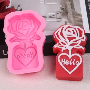 Detailed view of pink rose heart silicone mold and its red finished candle product
