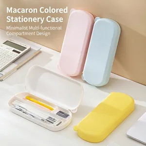 Estuche multifuncional de plástico en colores macaron con tres compartimentos para estudiantes
